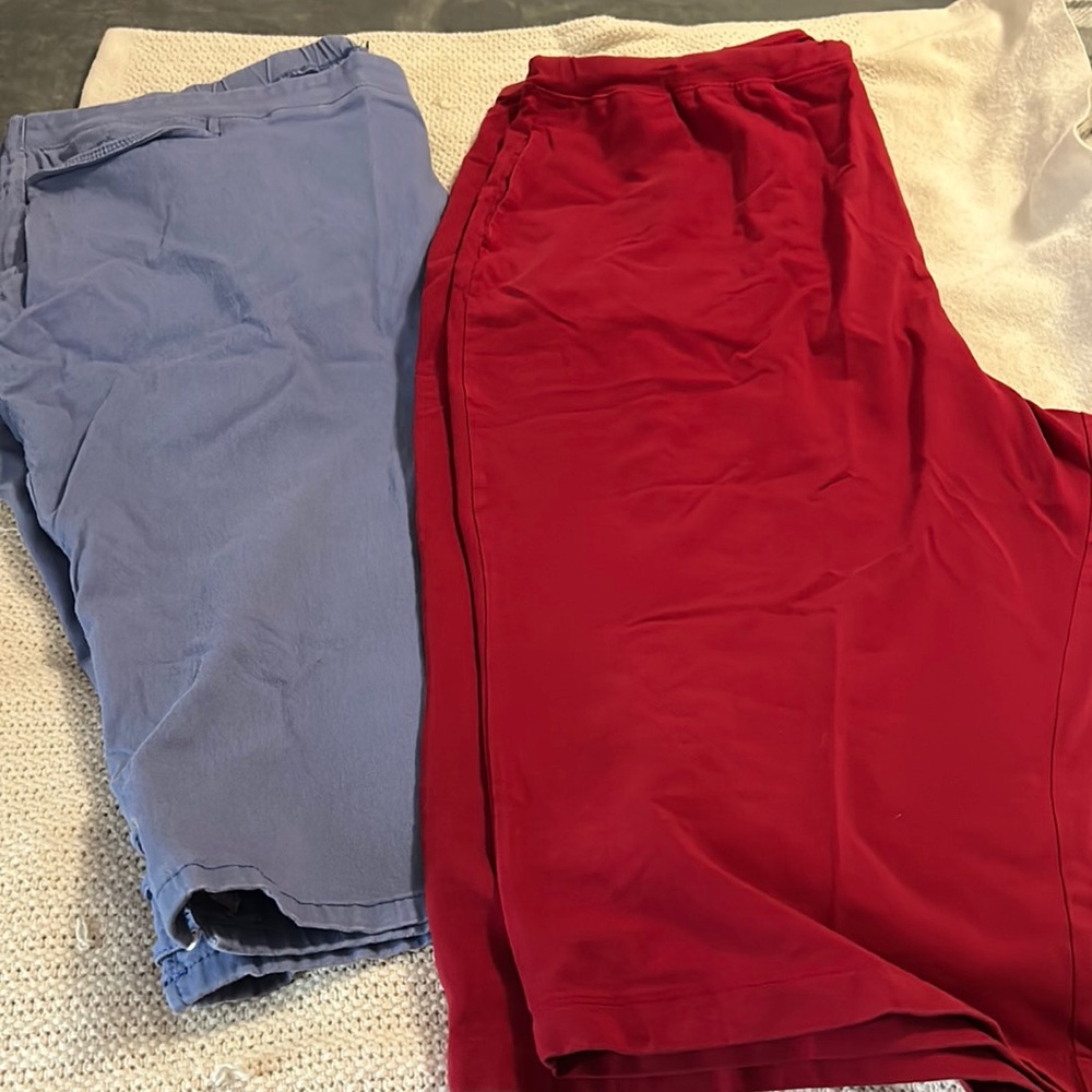 Two pair of capris, by Catherine’s. 1 is stretch denim and 1 is red burgundy.